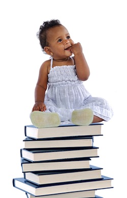 Baby on pile of books