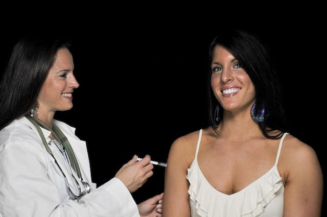 woman-getting-injection-from-doctor