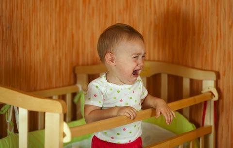 Baby crying in crib