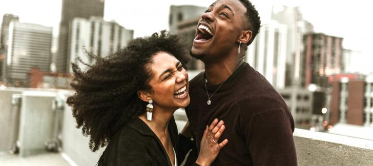 black-couple-man-woman-laughing-and-happy
