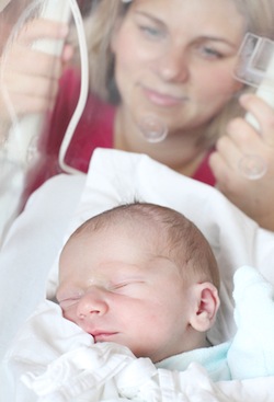 Newborn baby sleeps in hospital