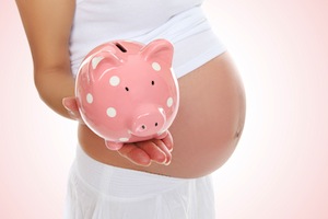 Pregnant with piggy bank